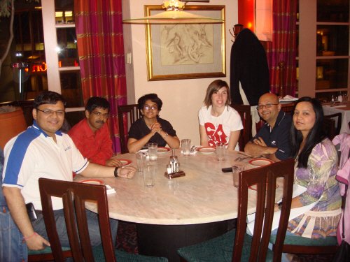 Group at dining table during event.